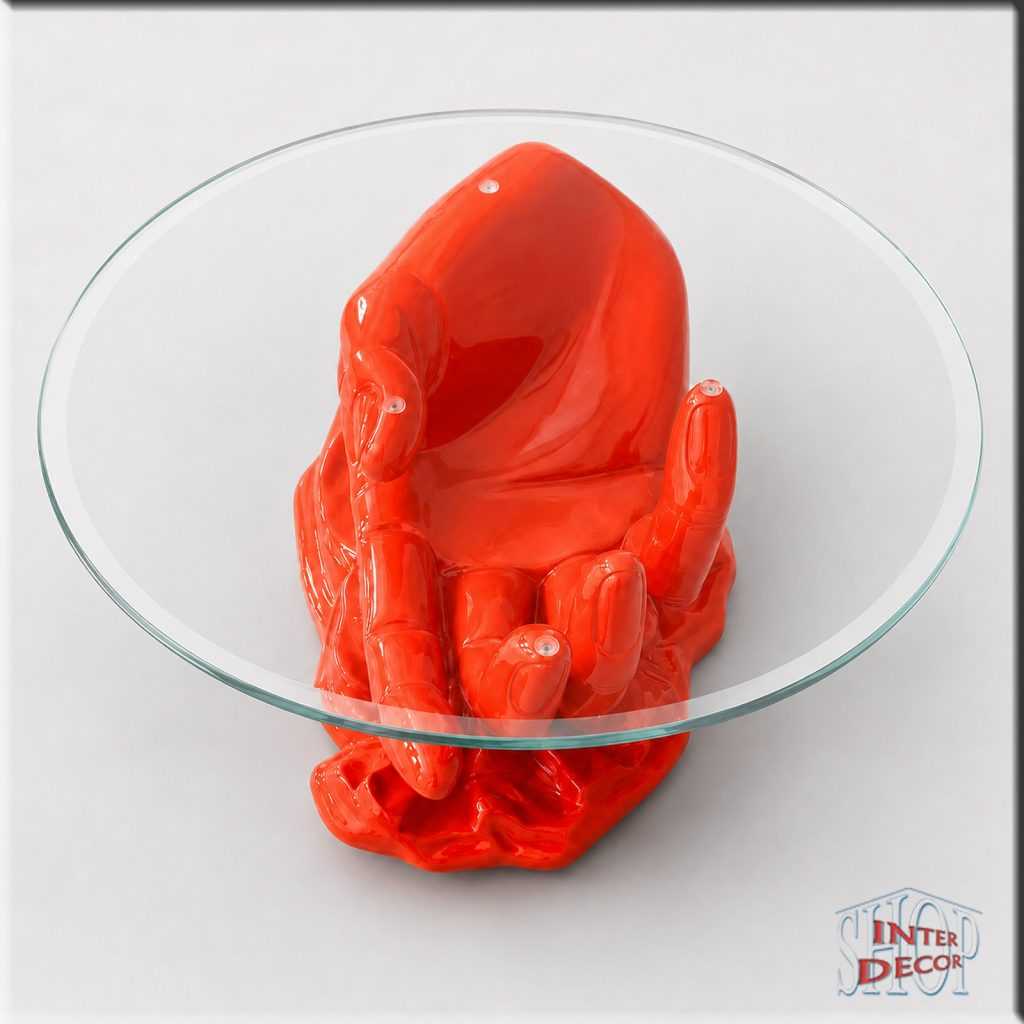 Glastisch-mit-plastischer-Handfigur-Wohnzimmertisch-Farbe-Orange