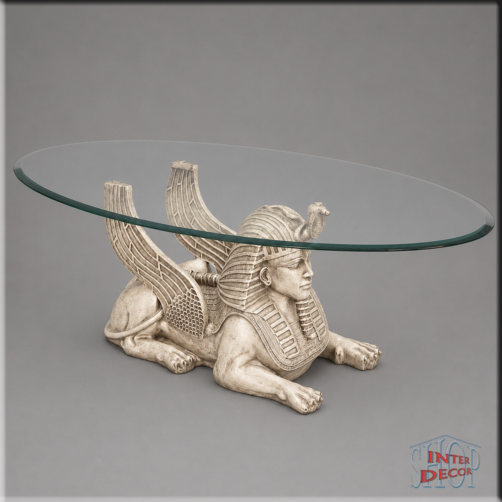 Ägyptischer-Couchtisch-mit-detaillierter-Sphinx-Figur-Antik-Creme