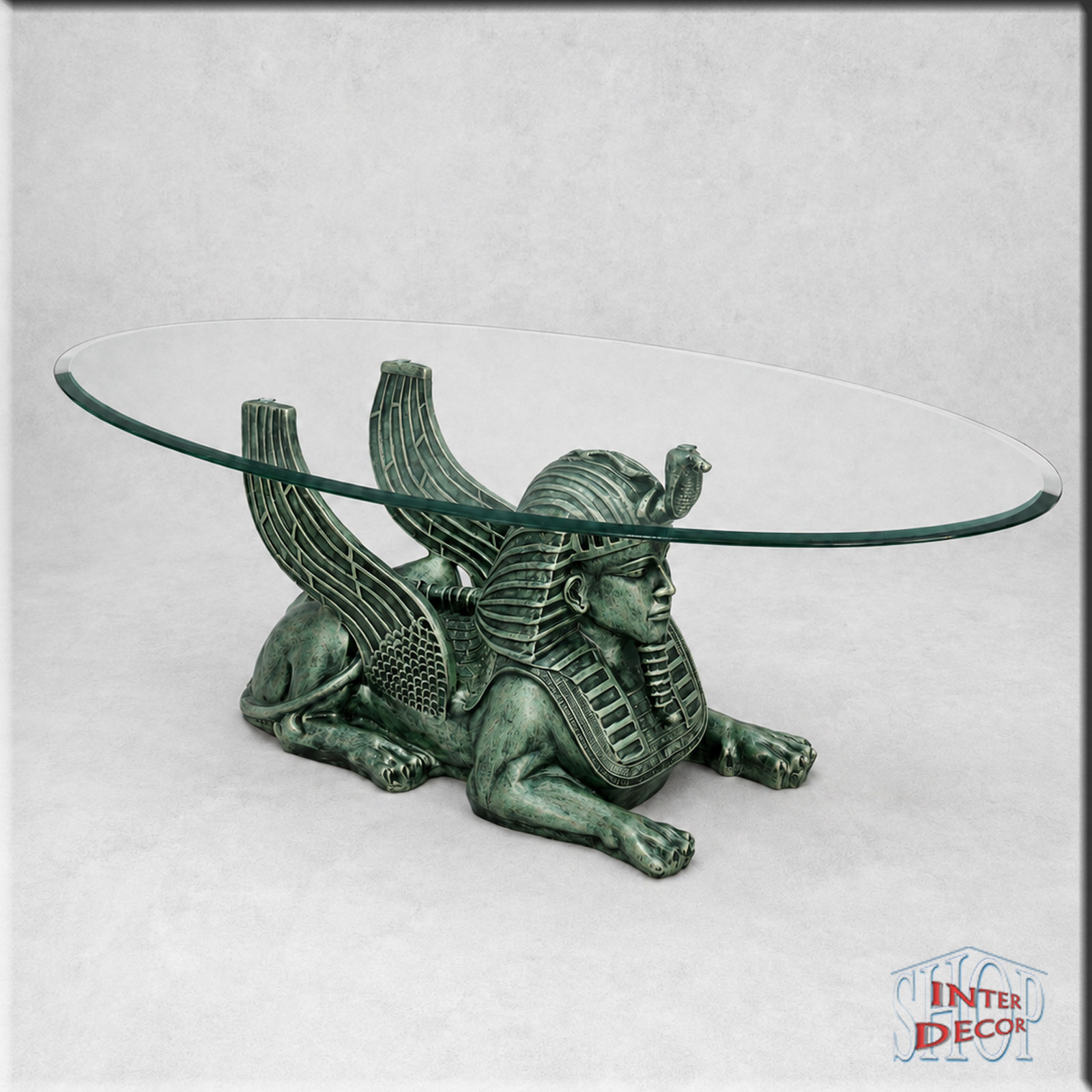 Sphinx-Glastisch-mit-dekorativen-großen-Flügeln-Antik-Grün